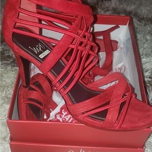 Red strappy heels